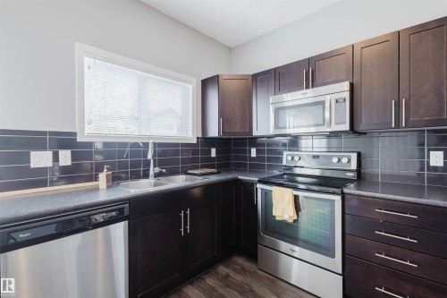 9 6520 2 Avenue, Edmonton, AB - Indoor Photo Showing Kitchen With Stainless Steel Kitchen