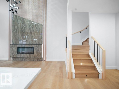 15419 20 Street, Edmonton, AB - Indoor Photo Showing Other Room With Fireplace