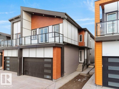 Modern home with a garage, a balcony, and entry steps - 15419 20 Street, Edmonton, AB - Outdoor