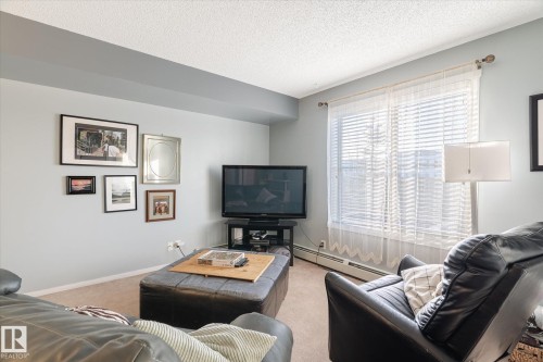 115 3315 James Mowatt Trail, Edmonton, AB - Indoor Photo Showing Living Room