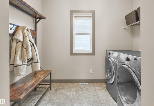 5703 Edworthy Landing, Edmonton, AB - Indoor Photo Showing Laundry Room