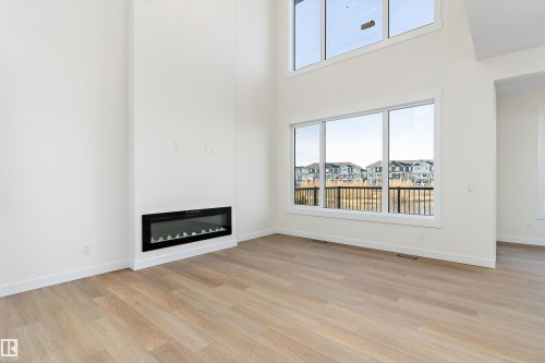 1084 Cristall Crescent, Edmonton, AB - Indoor Photo Showing Living Room With Fireplace