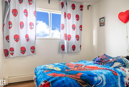 201 104 10 Street, Cold Lake, AB - Indoor Photo Showing Bedroom