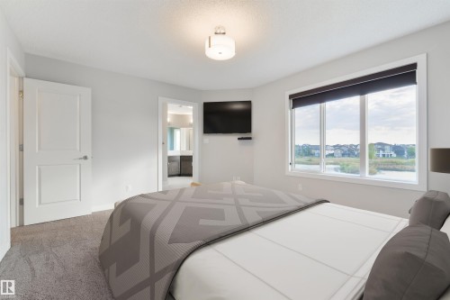 63 Dalquist Bay, Leduc, AB - Indoor Photo Showing Bedroom