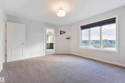 63 Dalquist Bay, Leduc, AB - Indoor Photo Showing Other Room