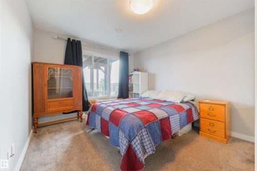 63 Dalquist Bay, Leduc, AB - Indoor Photo Showing Bedroom