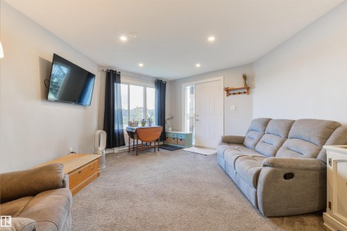 63 Dalquist Bay, Leduc, AB - Indoor Photo Showing Living Room
