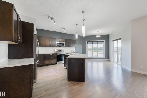 63 Dalquist Bay, Leduc, AB - Indoor Photo Showing Kitchen