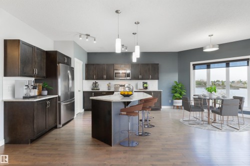 63 Dalquist Bay, Leduc, AB - Indoor Photo Showing Kitchen With Upgraded Kitchen