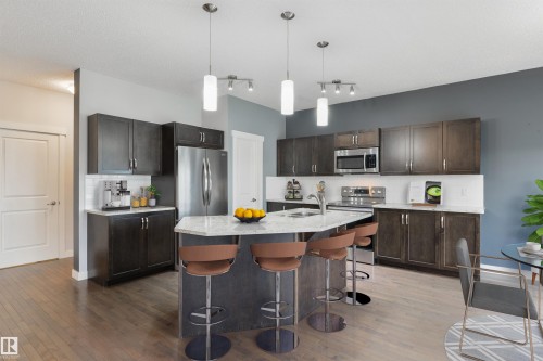 63 Dalquist Bay, Leduc, AB - Indoor Photo Showing Kitchen With Upgraded Kitchen