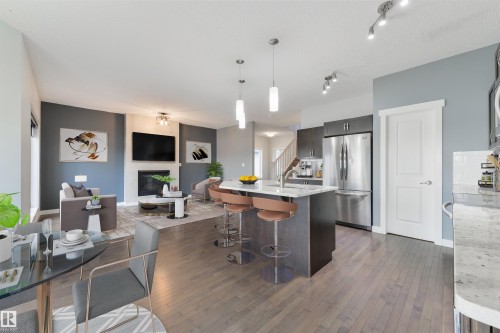 63 Dalquist Bay, Leduc, AB - Indoor Photo Showing Kitchen With Upgraded Kitchen