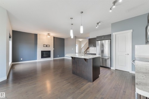 63 Dalquist Bay, Leduc, AB - Indoor Photo Showing Kitchen With Upgraded Kitchen