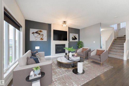 63 Dalquist Bay, Leduc, AB - Indoor Photo Showing Living Room With Fireplace