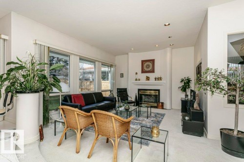 78 Wilkin Road, Edmonton, AB - Indoor Photo Showing Other Room With Fireplace
