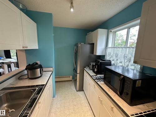 318 17109 67 Ave Nw, Edmonton, AB - Indoor Photo Showing Kitchen
