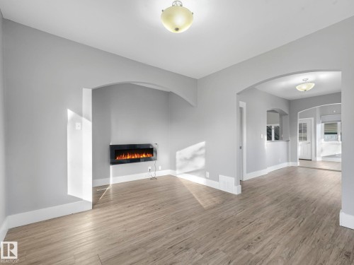 4315 52 Street, Wetaskiwin, AB - Indoor Photo Showing Living Room With Fireplace