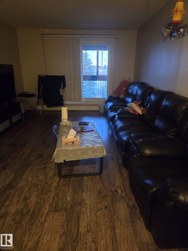 412 2620 Mill Woods Road E, Edmonton, AB - Indoor Photo Showing Living Room