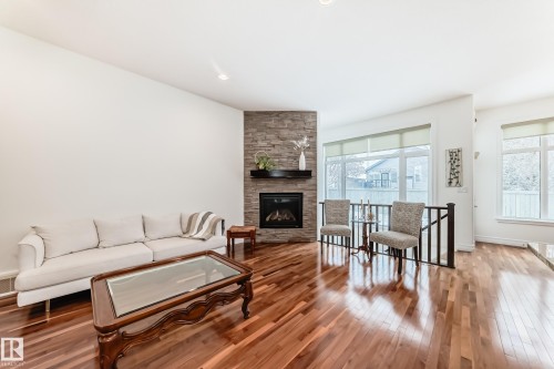 6107 Maynard Crescent, Edmonton, AB - Indoor Photo Showing Living Room With Fireplace