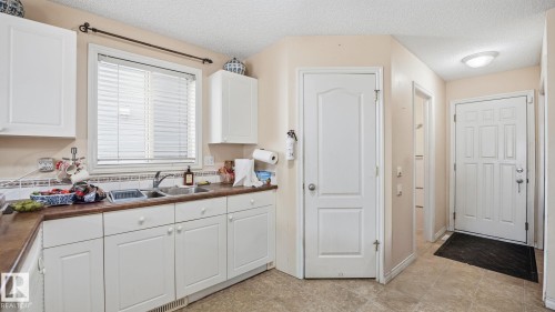 4712 201 Street, Edmonton, AB - Indoor Photo Showing Kitchen With Double Sink