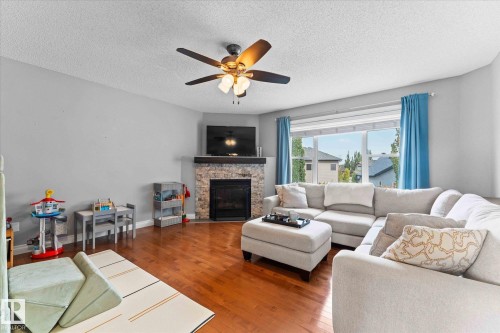 26 Linkside Way, Spruce Grove, AB - Indoor Photo Showing Living Room With Fireplace