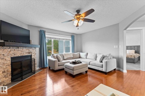 26 Linkside Way, Spruce Grove, AB - Indoor Photo Showing Living Room With Fireplace