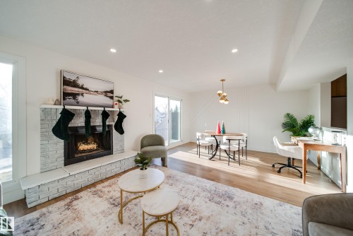 5394 38A Avenue, Edmonton, AB - Indoor Photo Showing Living Room With Fireplace
