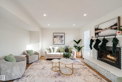 5394 38A Avenue, Edmonton, AB - Indoor Photo Showing Living Room With Fireplace