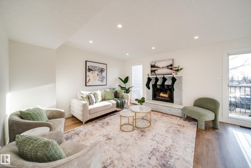 5394 38A Avenue, Edmonton, AB - Indoor Photo Showing Living Room With Fireplace