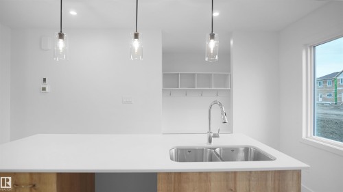 20827 16 Avenue, Edmonton, AB - Indoor Photo Showing Kitchen With Double Sink