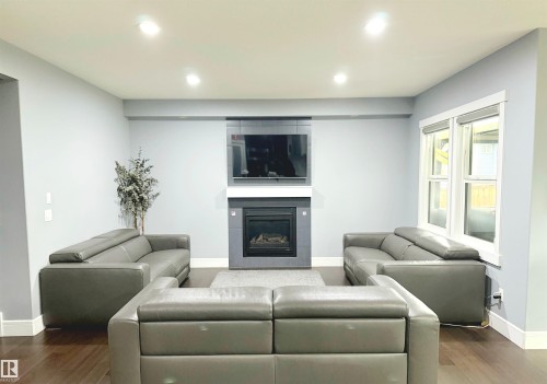 1357 Watt Drive, Edmonton, AB - Indoor Photo Showing Living Room With Fireplace