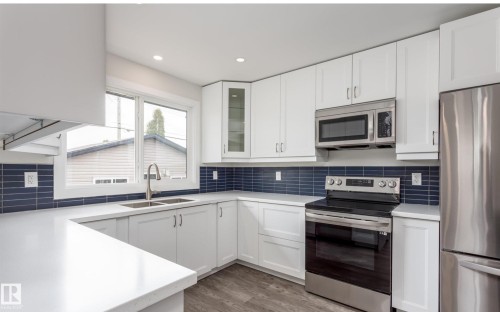 6511 95 Avenue, Edmonton, AB - Indoor Photo Showing Kitchen With Double Sink With Upgraded Kitchen
