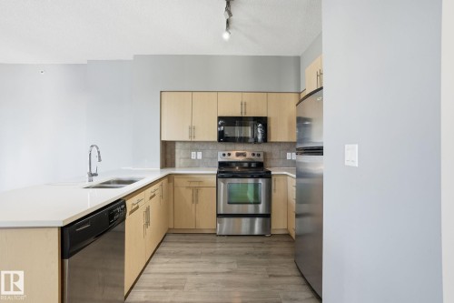 902 10136 104 Street, Edmonton, AB - Indoor Photo Showing Kitchen With Stainless Steel Kitchen With Double Sink
