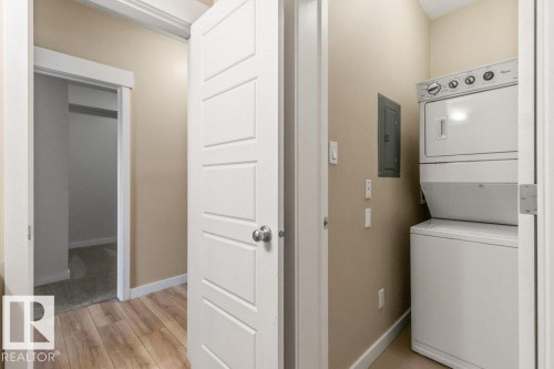 114 10518 113 Street, Edmonton, AB - Indoor Photo Showing Laundry Room