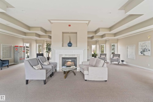 119 9535 176 Street, Edmonton, AB - Indoor Photo Showing Other Room With Fireplace