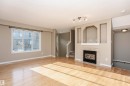 204 178 Bridgeport Boulevard, Leduc, AB  - Indoor Photo Showing Living Room With Fireplace 
