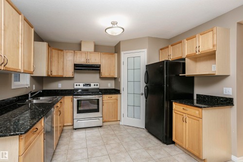 204 178 Bridgeport Boulevard, Leduc, AB - Indoor Photo Showing Kitchen With Double Sink