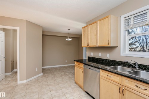 204 178 Bridgeport Boulevard, Leduc, AB - Indoor Photo Showing Kitchen With Double Sink