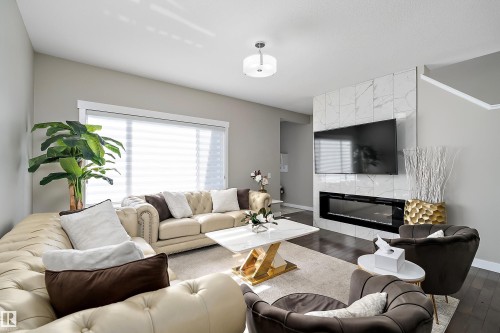 7043 174 Avenue, Edmonton, AB - Indoor Photo Showing Living Room With Fireplace