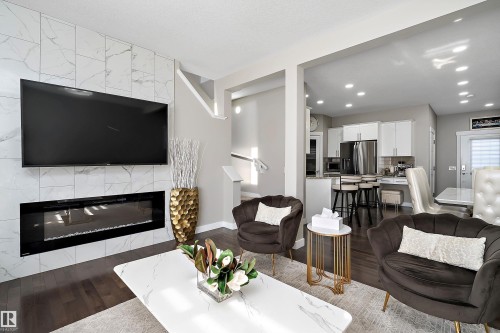 7043 174 Avenue, Edmonton, AB - Indoor Photo Showing Living Room With Fireplace