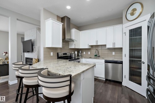 7043 174 Avenue, Edmonton, AB - Indoor Photo Showing Kitchen With Stainless Steel Kitchen