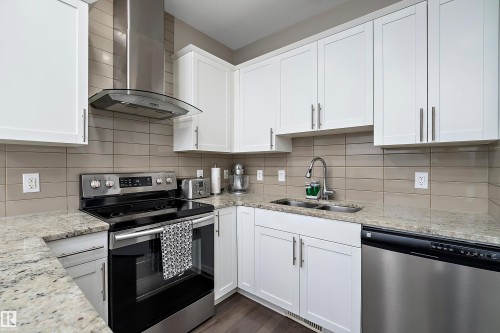 7043 174 Avenue, Edmonton, AB - Indoor Photo Showing Kitchen With Stainless Steel Kitchen With Double Sink With Upgraded Kitchen