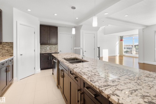 408 1350 Windermere Way, Edmonton, AB - Indoor Photo Showing Kitchen With Double Sink With Upgraded Kitchen