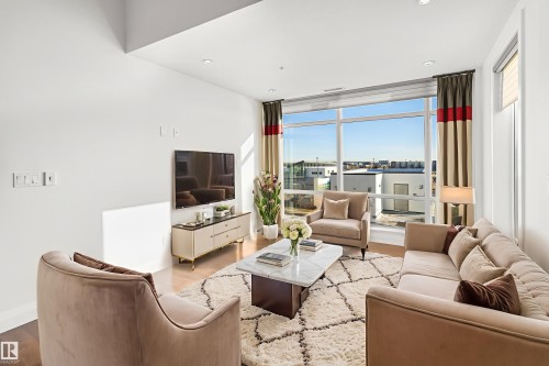 408 1350 Windermere Way, Edmonton, AB - Indoor Photo Showing Living Room
