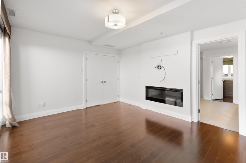 408 1350 Windermere Way, Edmonton, AB - Indoor With Fireplace
