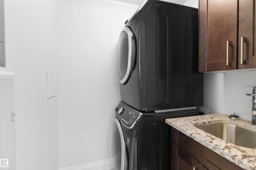 408 1350 Windermere Way, Edmonton, AB - Indoor Photo Showing Laundry Room