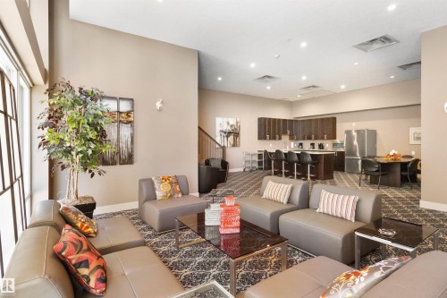 408 1350 Windermere Way, Edmonton, AB - Indoor Photo Showing Living Room