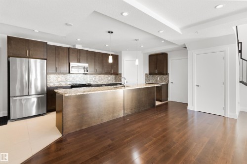 408 1350 Windermere Way, Edmonton, AB - Indoor Photo Showing Kitchen With Stainless Steel Kitchen With Upgraded Kitchen
