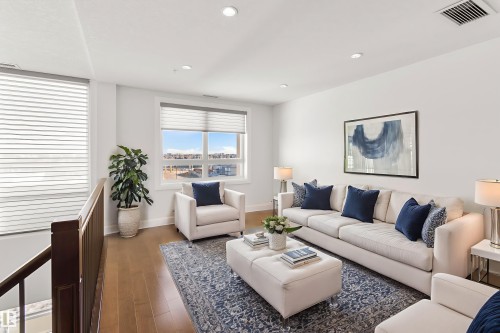 408 1350 Windermere Way, Edmonton, AB - Indoor Photo Showing Living Room