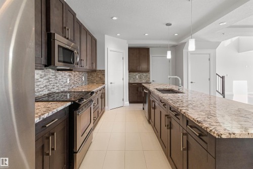 408 1350 Windermere Way, Edmonton, AB - Indoor Photo Showing Kitchen With Double Sink With Upgraded Kitchen