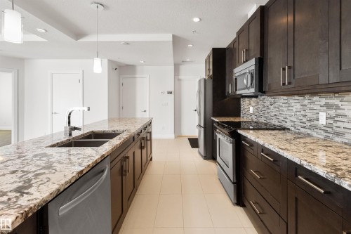 408 1350 Windermere Way, Edmonton, AB - Indoor Photo Showing Kitchen With Double Sink With Upgraded Kitchen